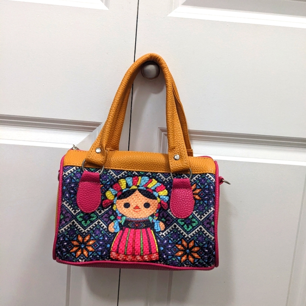 Cute Mexican rag doll purse.